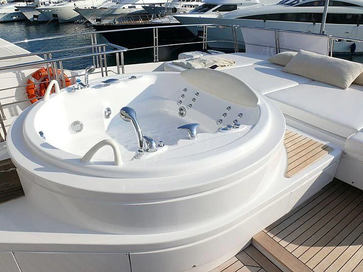 a white bathtub with a faucet aboard ARGO B Yacht for Sale