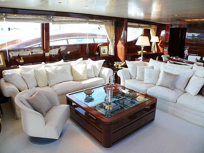 a living room with a large window aboard ARGO B Yacht for Sale