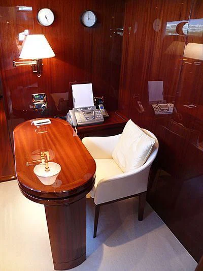 a room with a desk and a chair aboard ARGO B Yacht for Sale