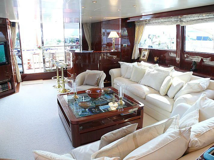 a living room with a large window aboard ARGO B Yacht for Sale