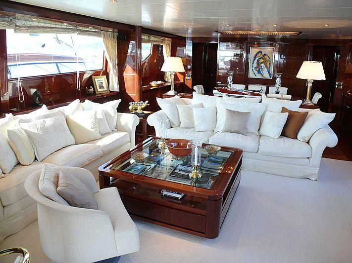 a living room with a large window aboard ARGO B Yacht for Sale
