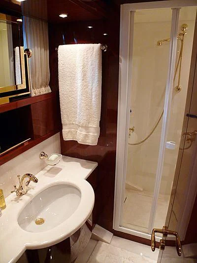 a bathroom with a sink and a shower aboard ARGO B Yacht for Sale
