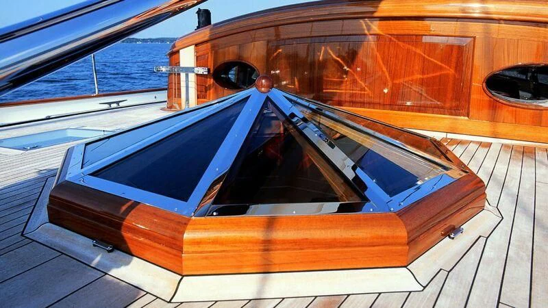 a wooden boat on a deck aboard MARIA CATTIVA Yacht for Sale