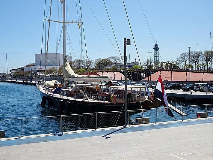 a boat docked at a pier aboard MARIA CATTIVA Yacht for Sale