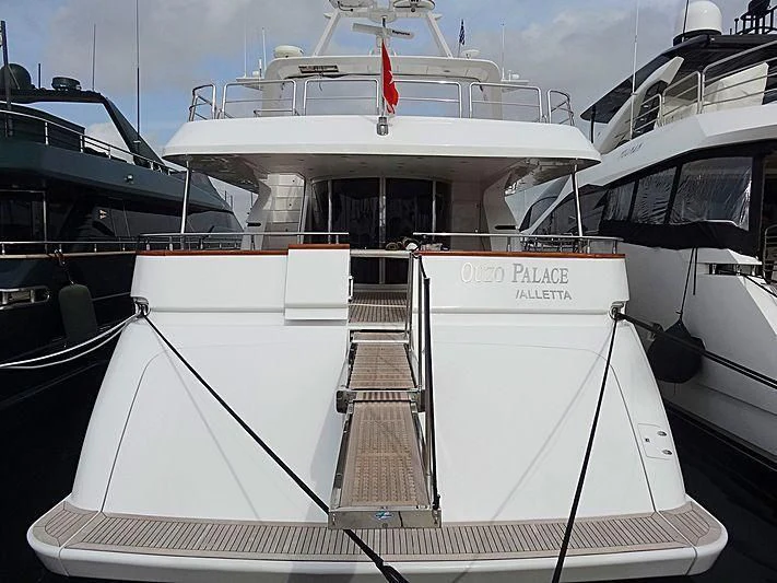 a boat with a staircase aboard OUZO PALACE Yacht for Sale