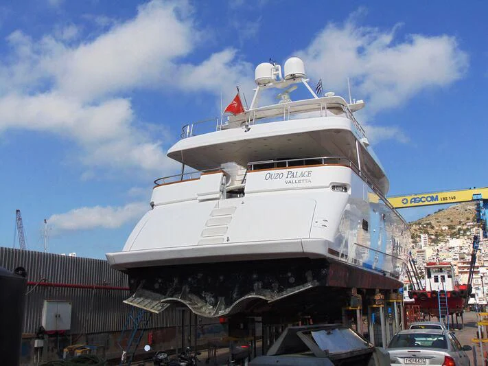 a large white ship aboard OUZO PALACE Yacht for Sale