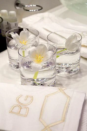 a candle in a glass with a candle in it aboard BG Yacht for Sale