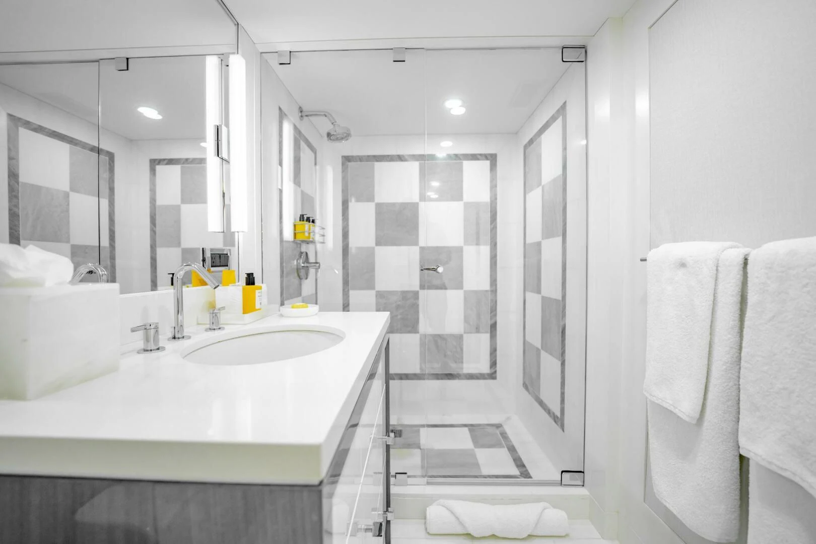 a bathroom with a large mirror aboard BG Yacht for Sale
