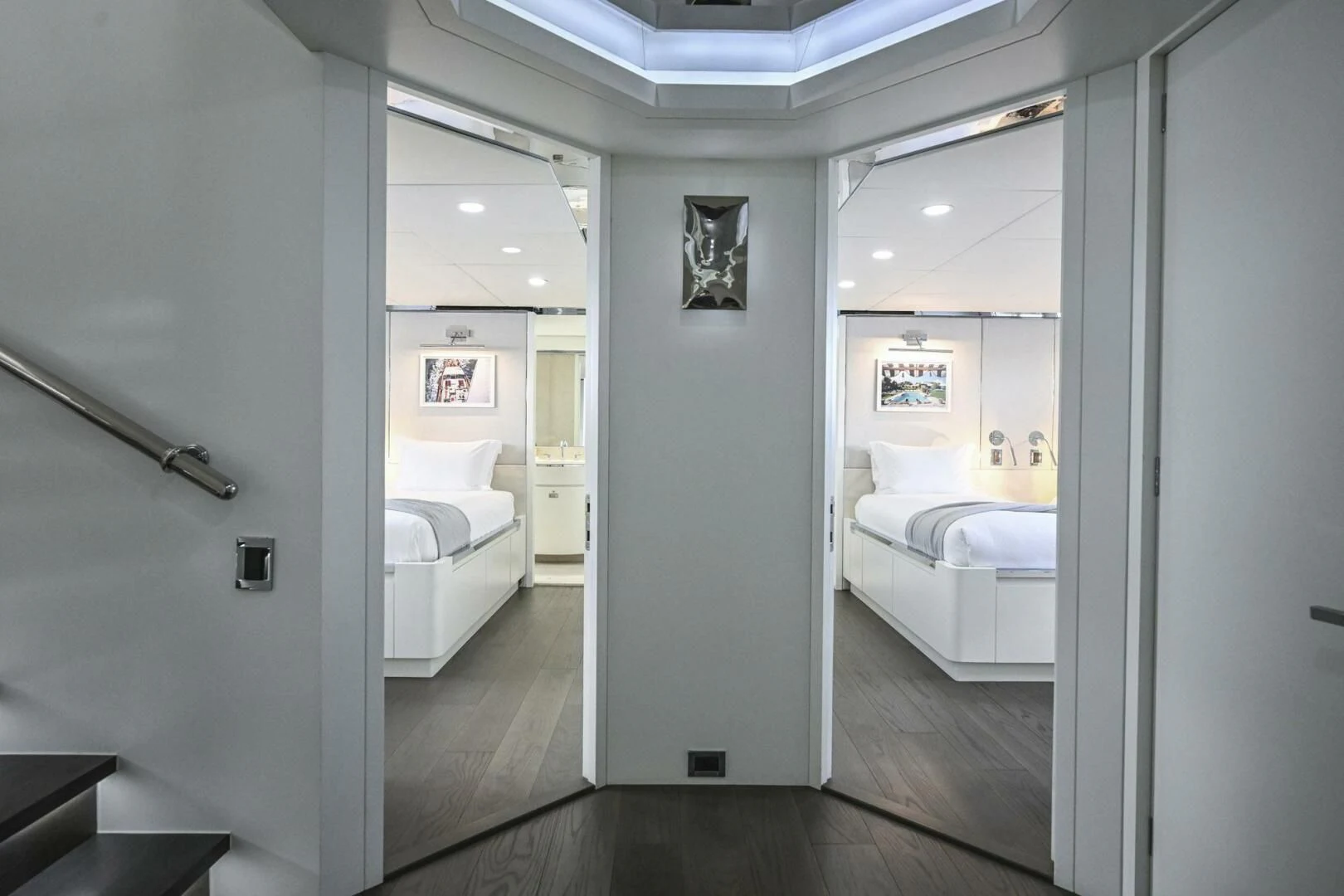 a room with a bed and a mirror aboard BG Yacht for Sale