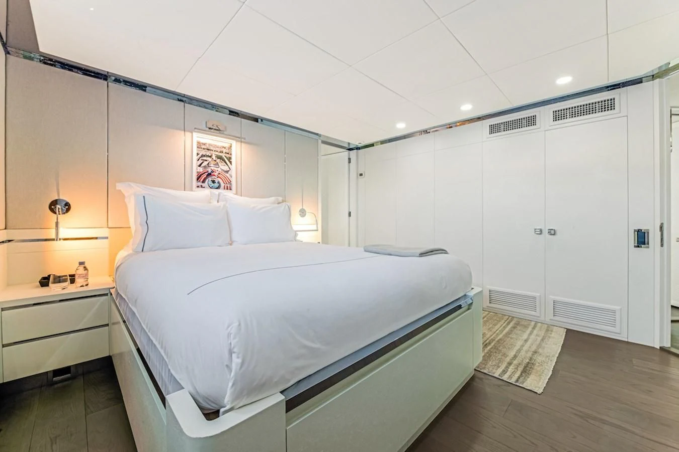 a bedroom with a bed aboard BG Yacht for Sale