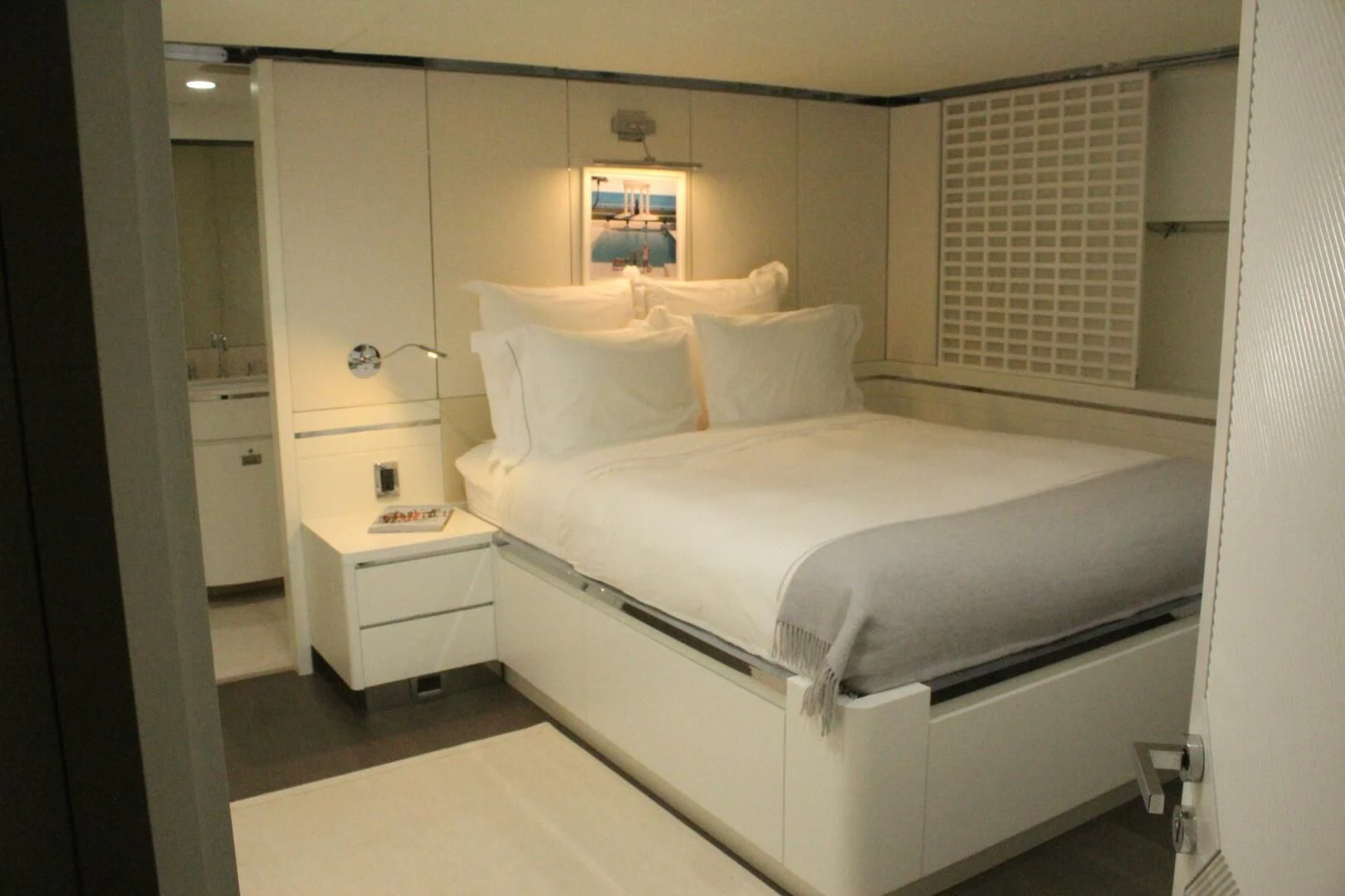 a bed in a room aboard BG Yacht for Sale
