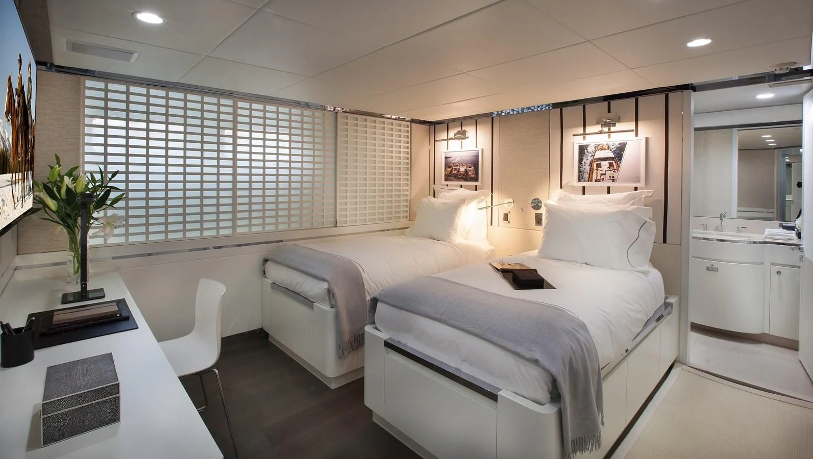 a room with two beds aboard BG Yacht for Sale