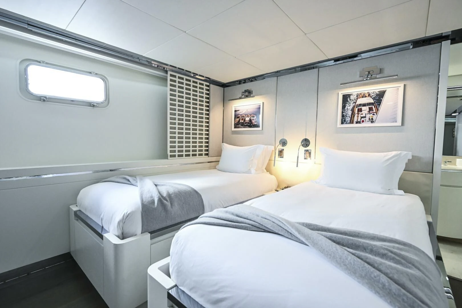 a couple of beds in a room aboard BG Yacht for Sale