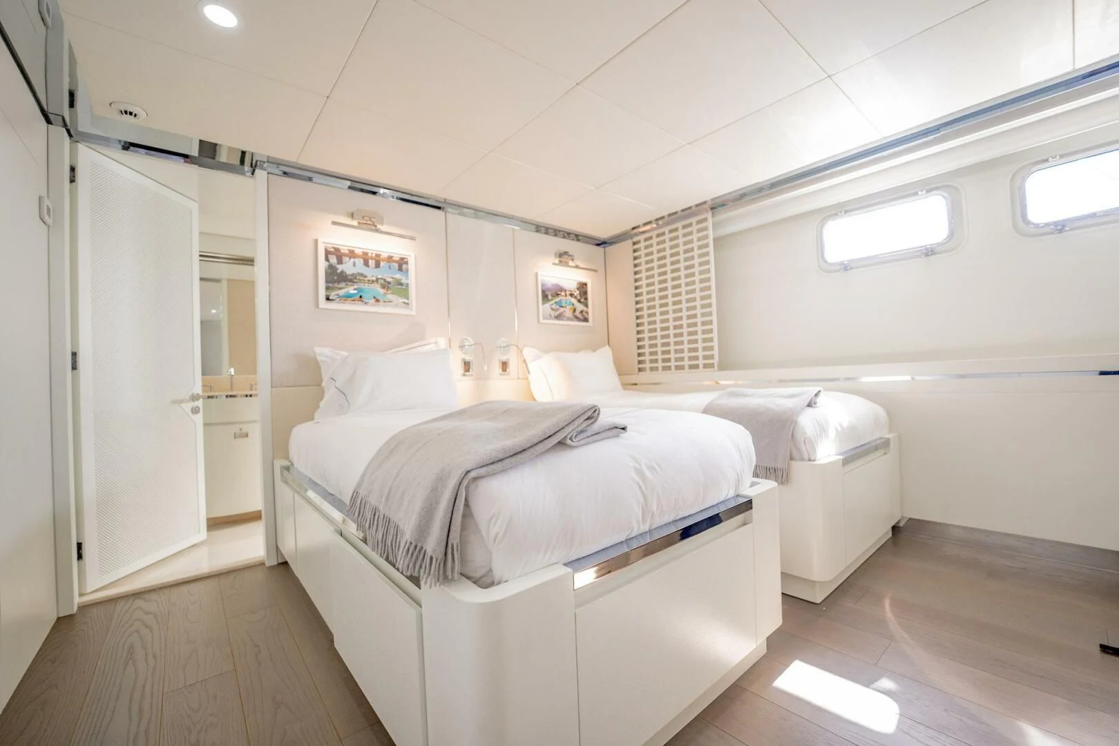 a room with two beds aboard BG Yacht for Sale