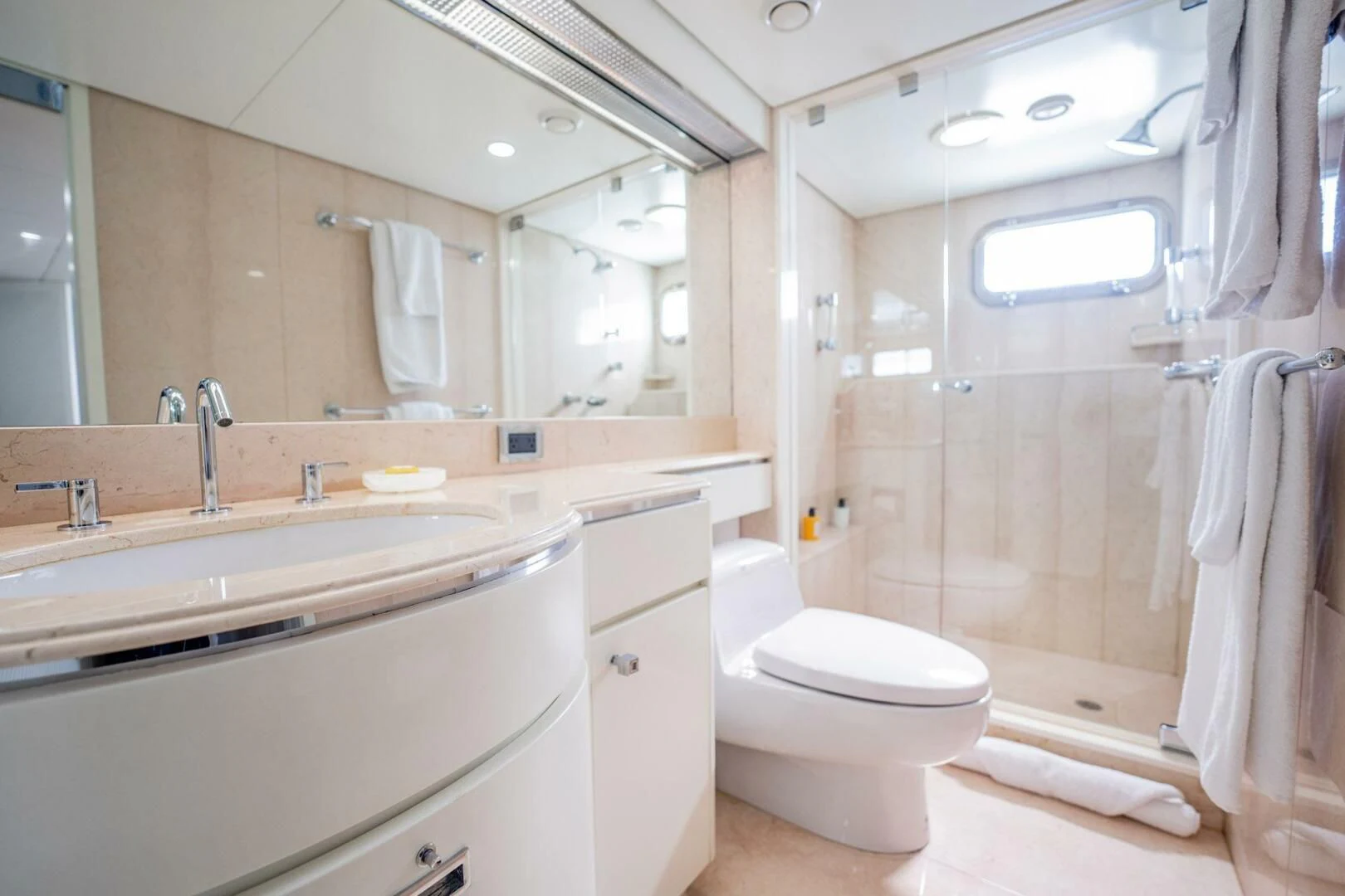 a bathroom with a sink toilet and a bathtub aboard BG Yacht for Sale