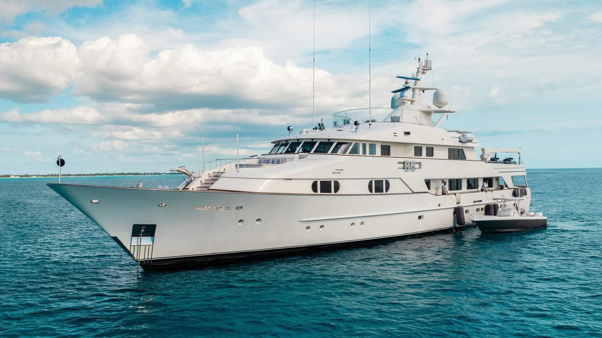 a large white boat in the water aboard BG Yacht for Sale