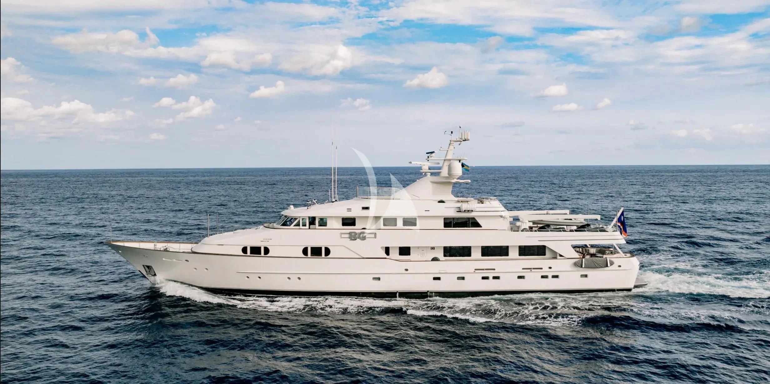 a white yacht in the ocean aboard BG Yacht for Sale
