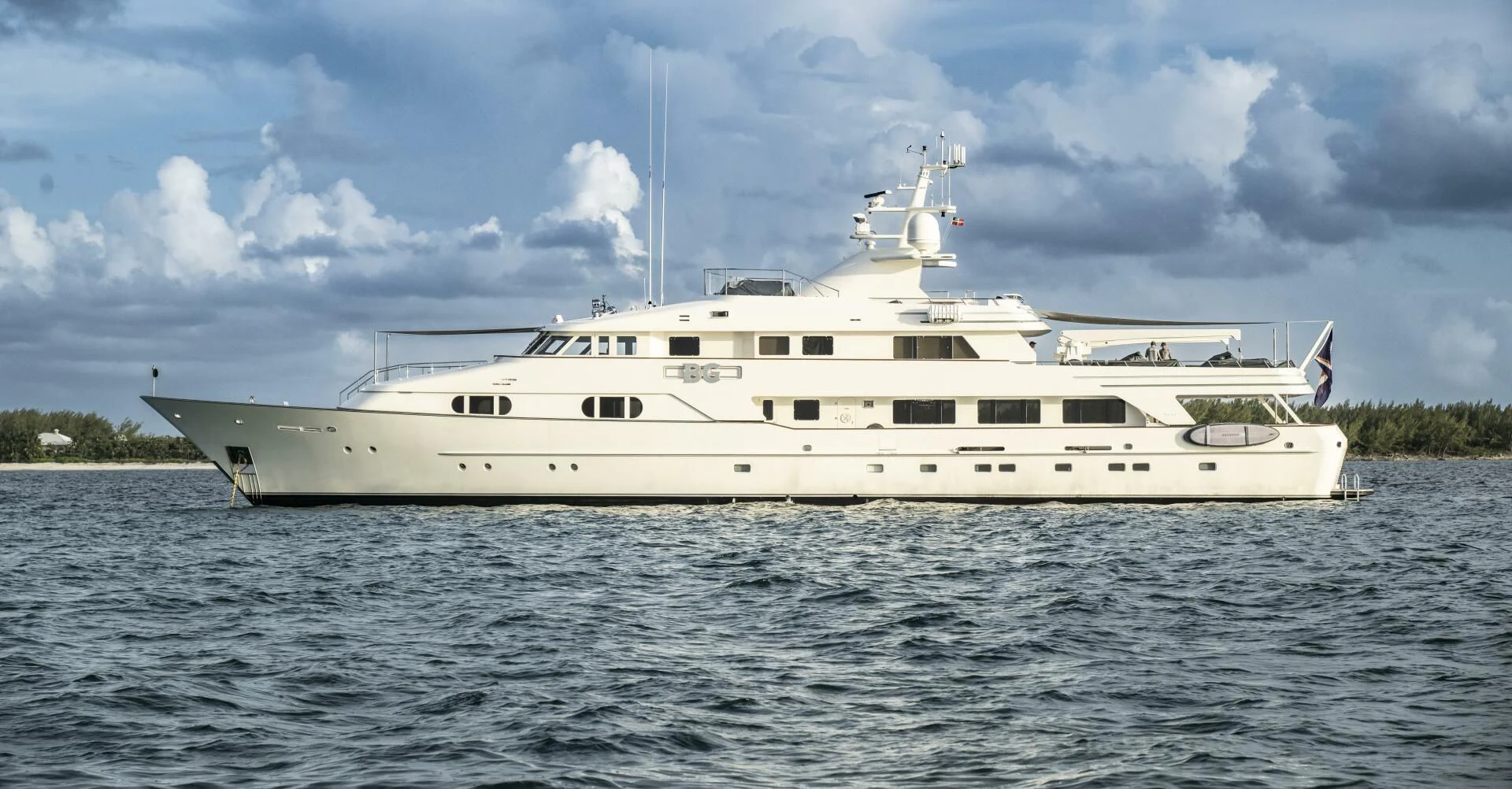 a large white ship in the water aboard BG Yacht for Sale