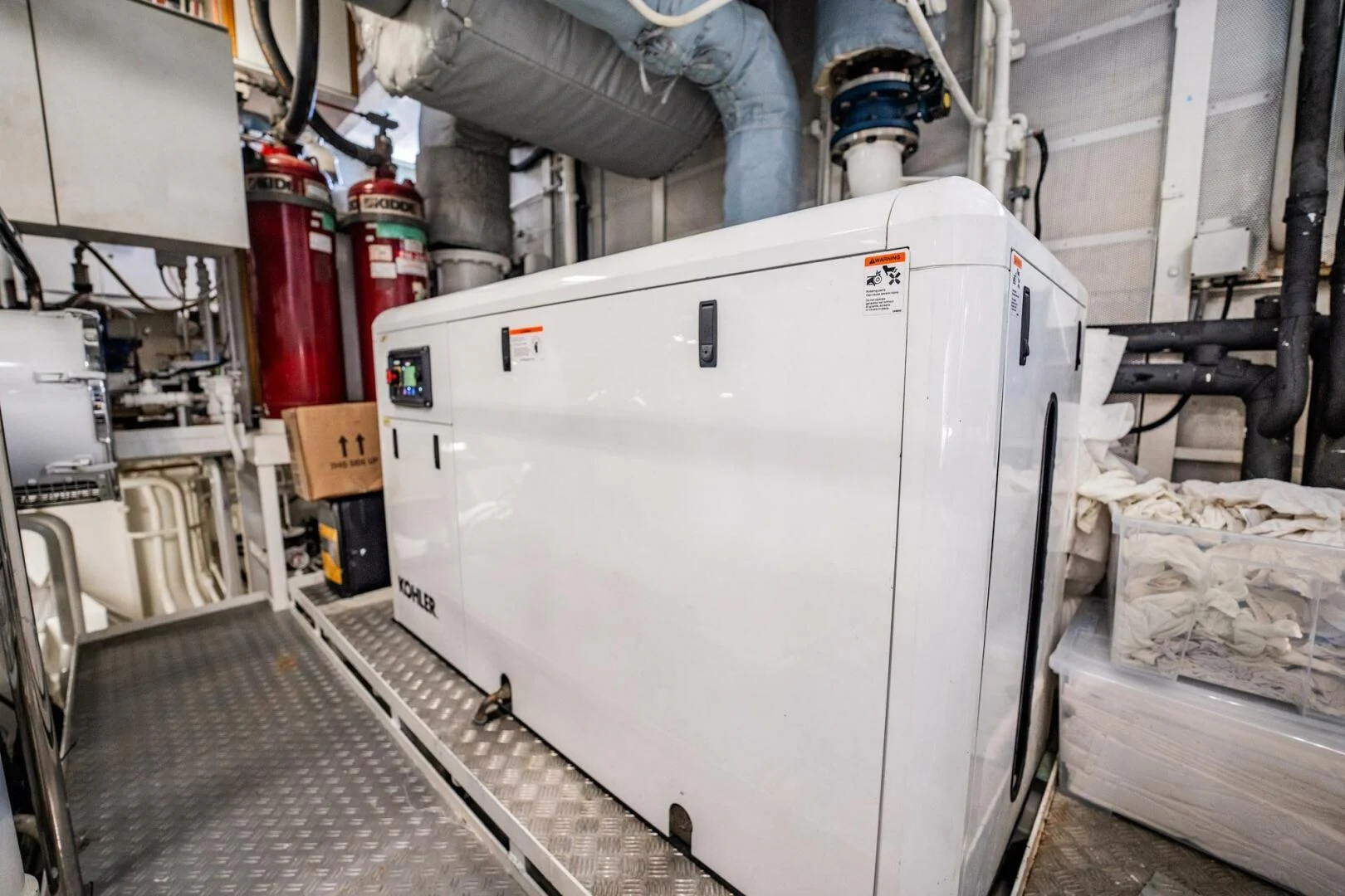 a large white machine aboard BG Yacht for Sale