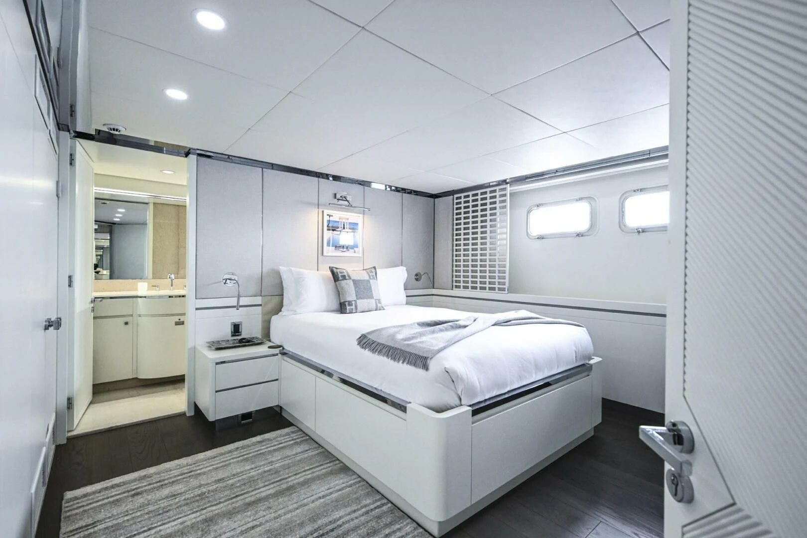 a bedroom with a bed aboard BG Yacht for Sale