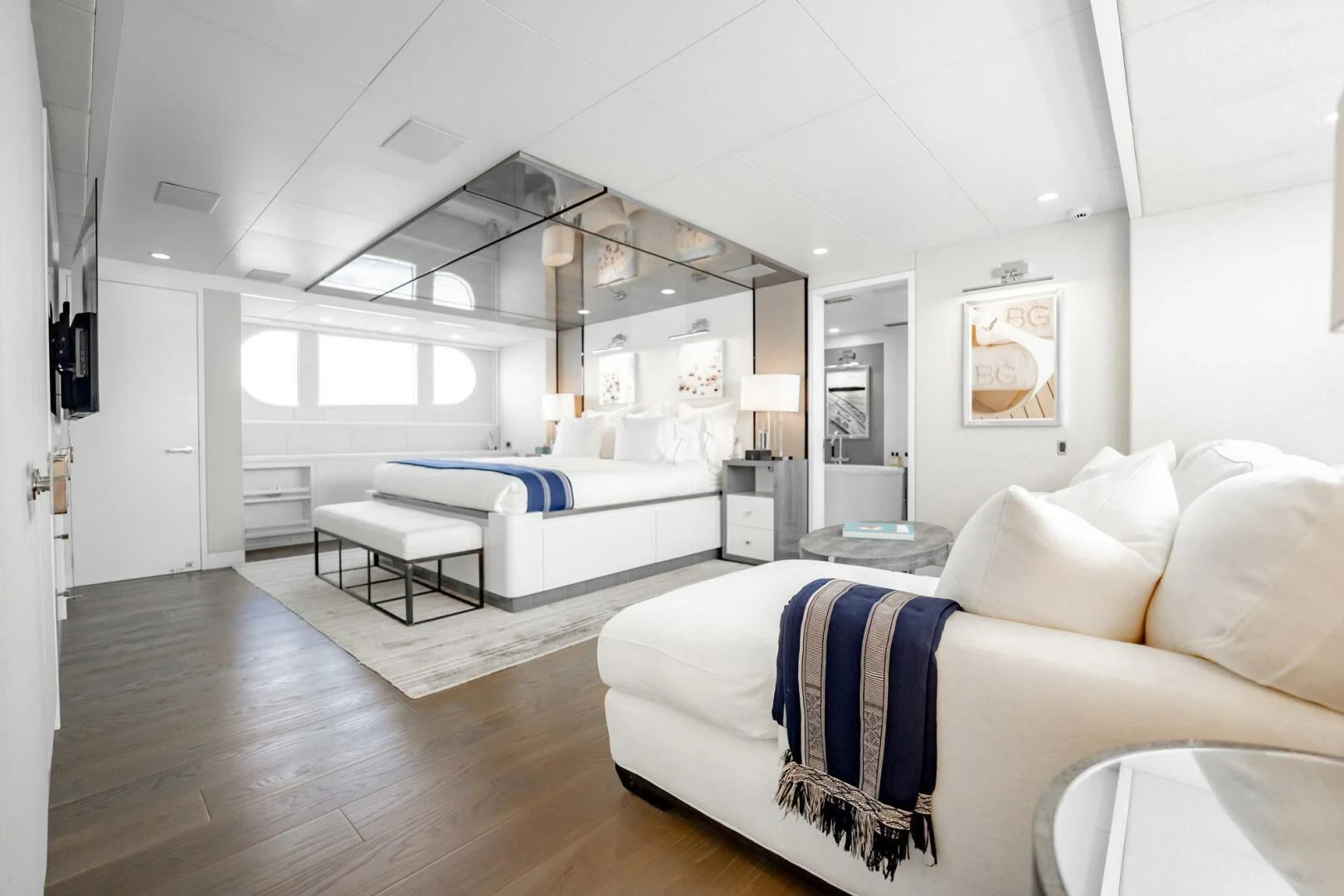 a room with a bed and a table aboard BG Yacht for Sale