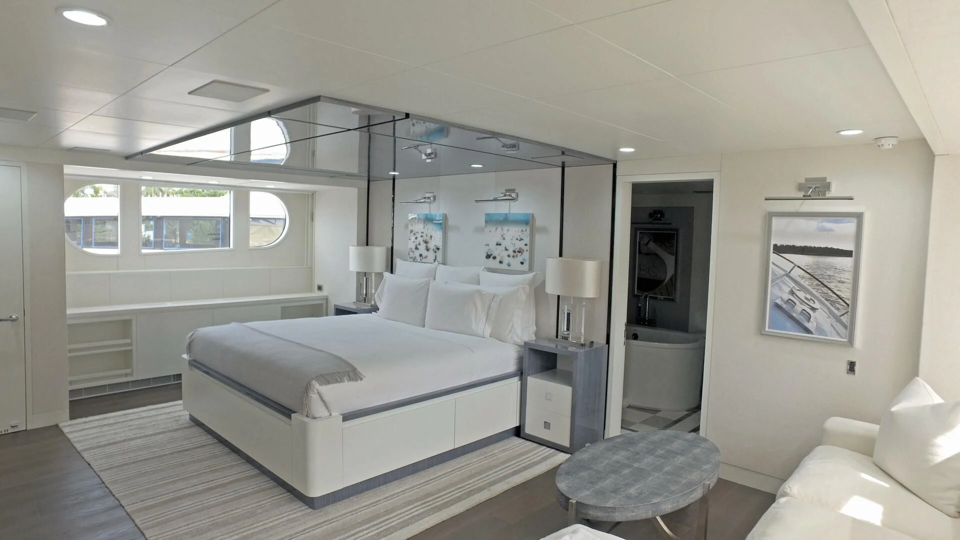 a bedroom with a large bed aboard BG Yacht for Sale