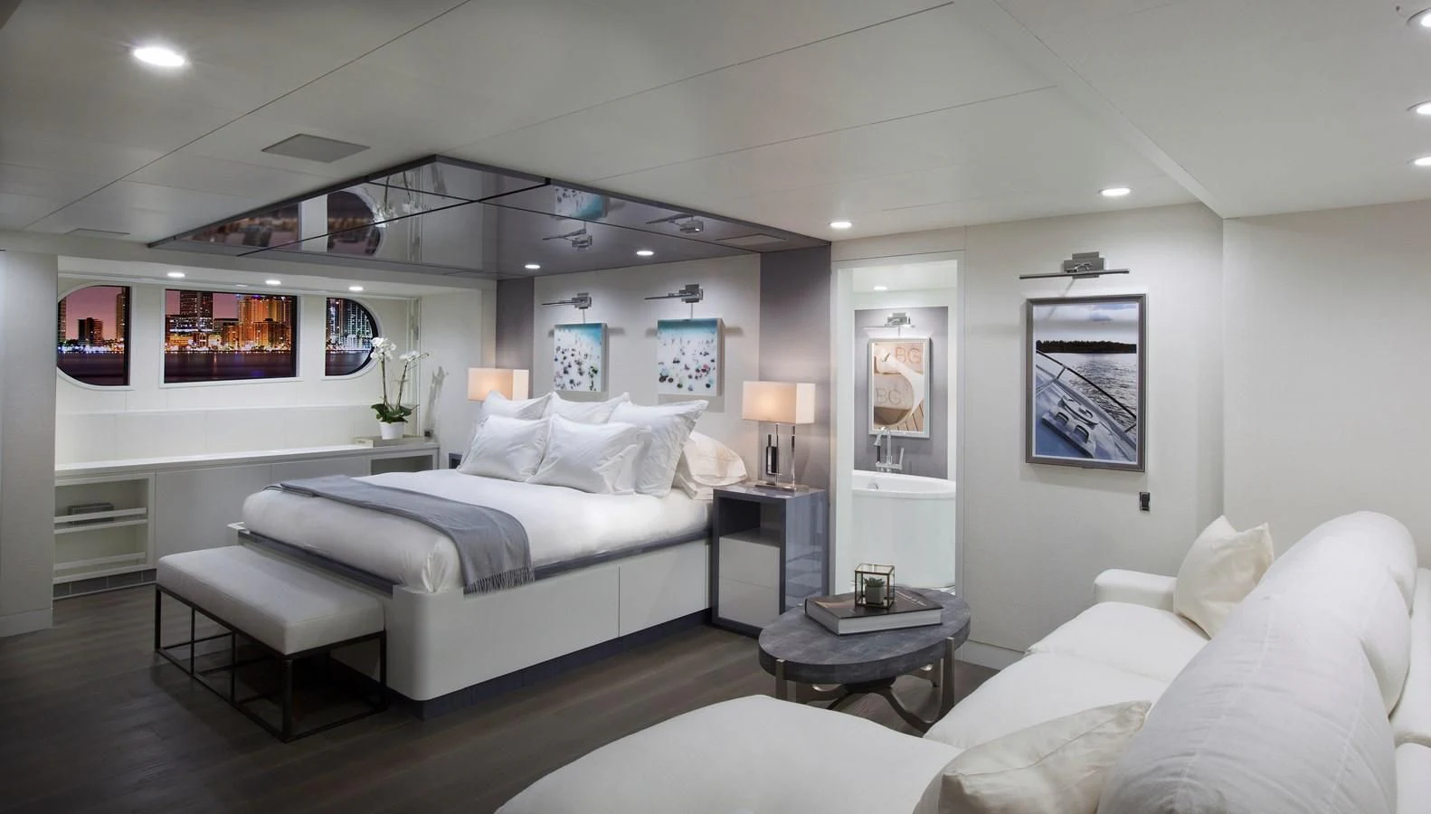 a room with a bed and a television aboard BG Yacht for Sale