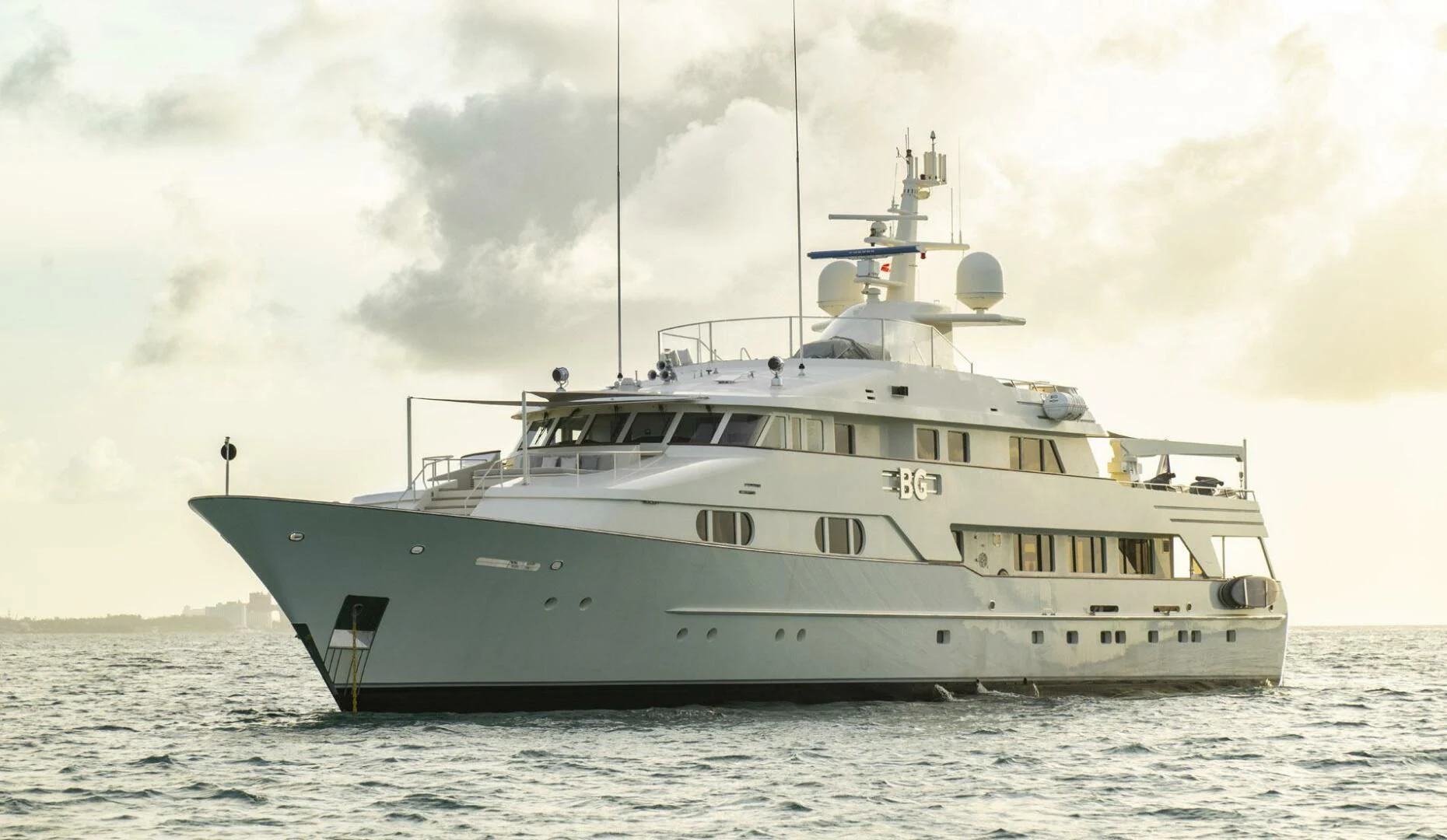 a large white ship aboard BG Yacht for Sale