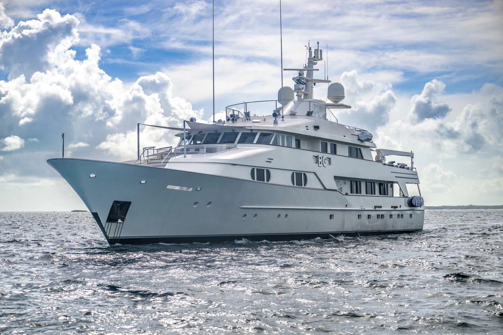 a large white boat in the water aboard BG Yacht for Sale