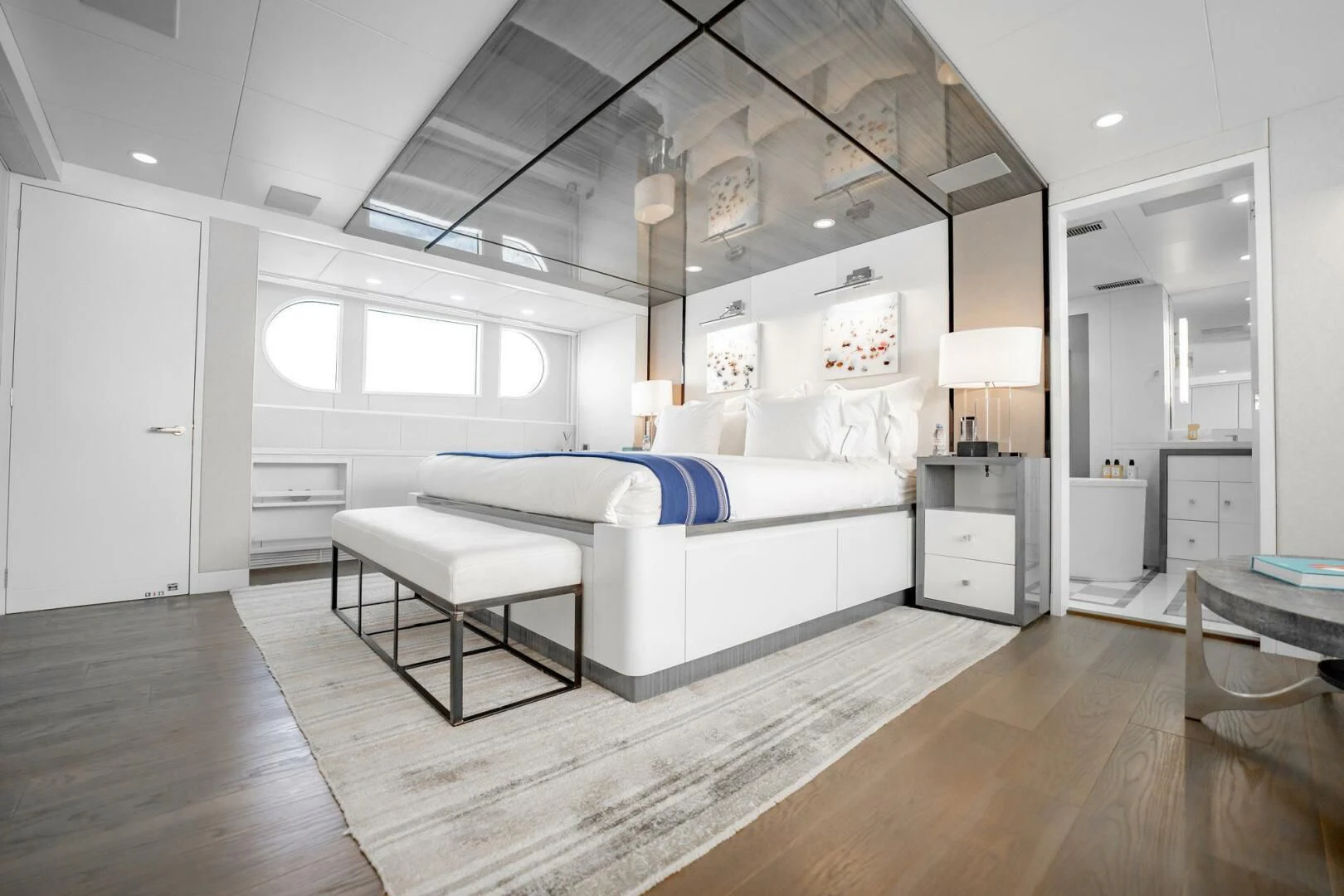 a room with a bed and a table aboard BG Yacht for Sale