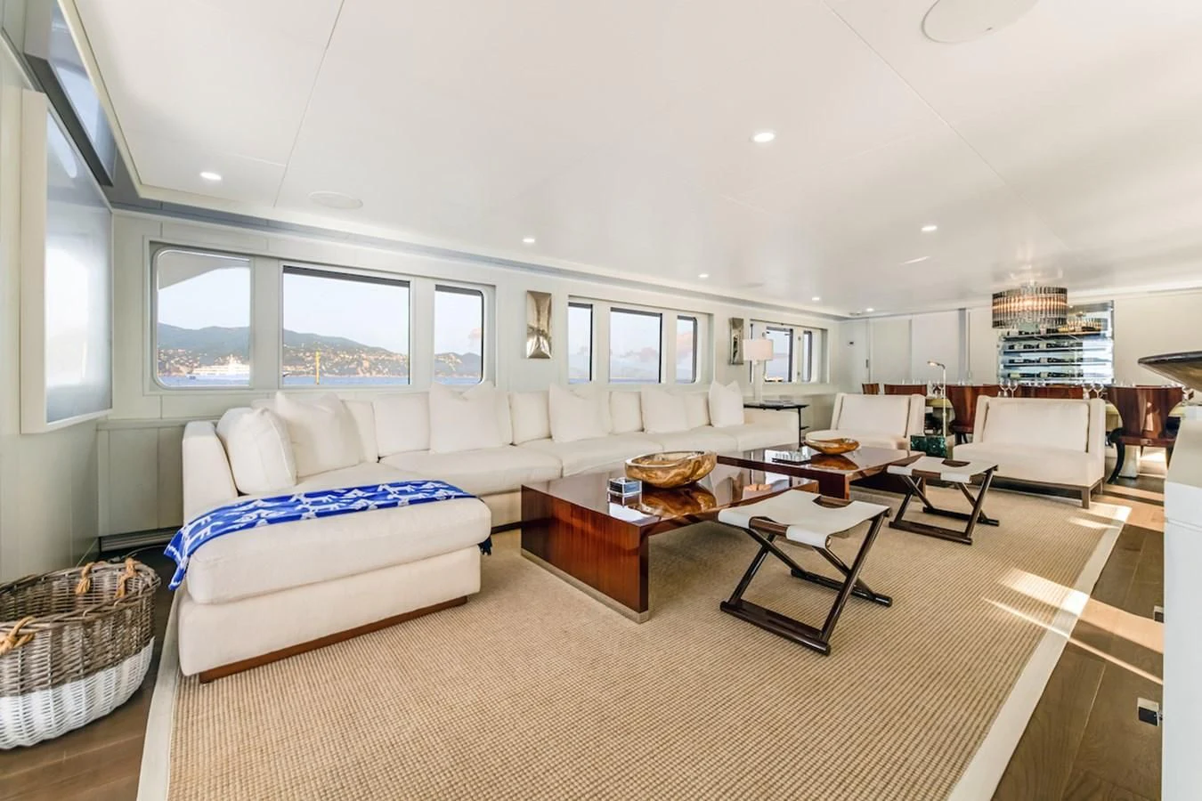 a living room with a couch and a coffee table aboard BG Yacht for Sale