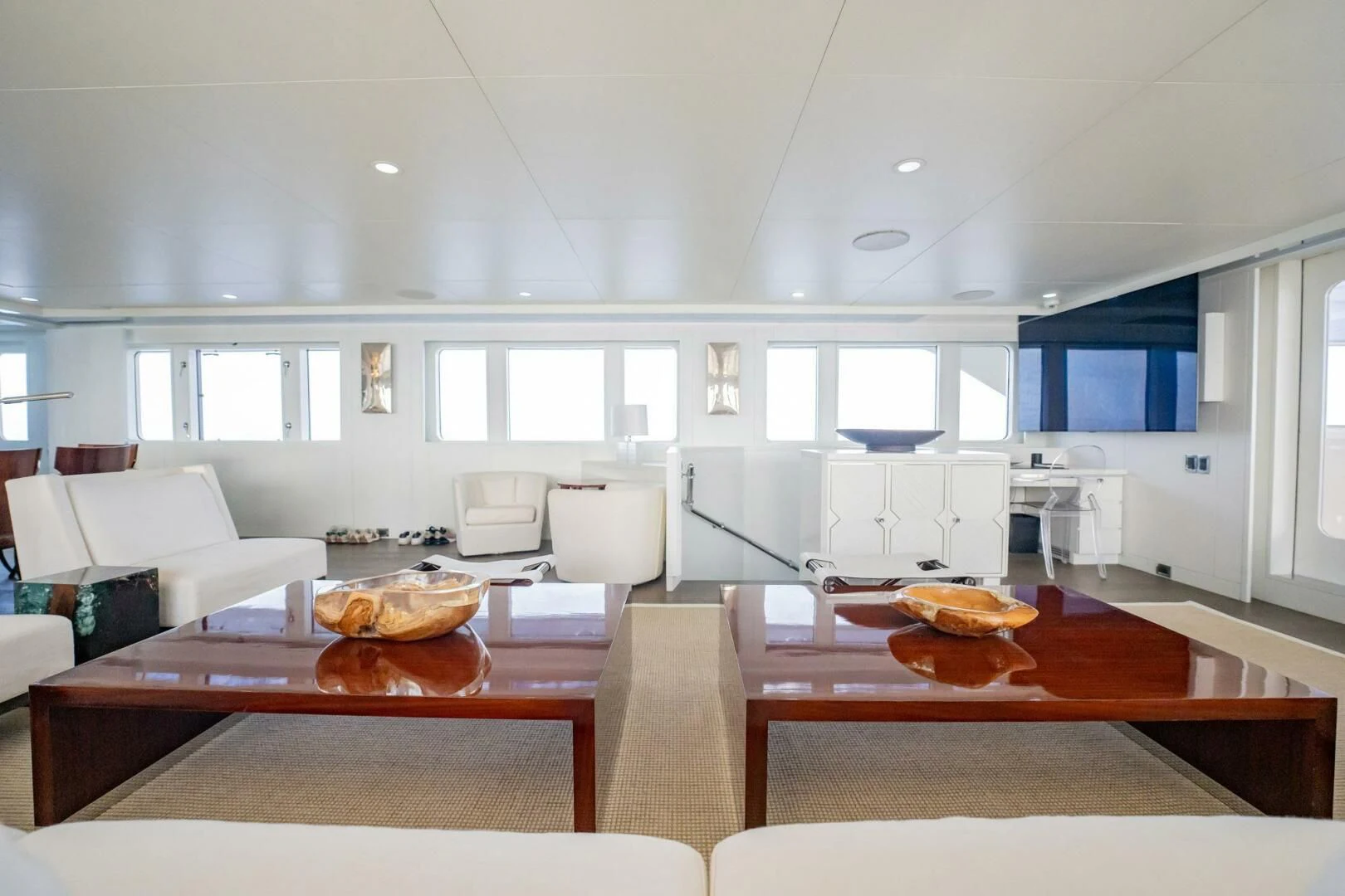 a kitchen with a table and chairs aboard BG Yacht for Sale