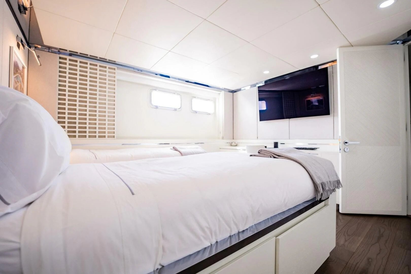 a room with two beds aboard BG Yacht for Sale