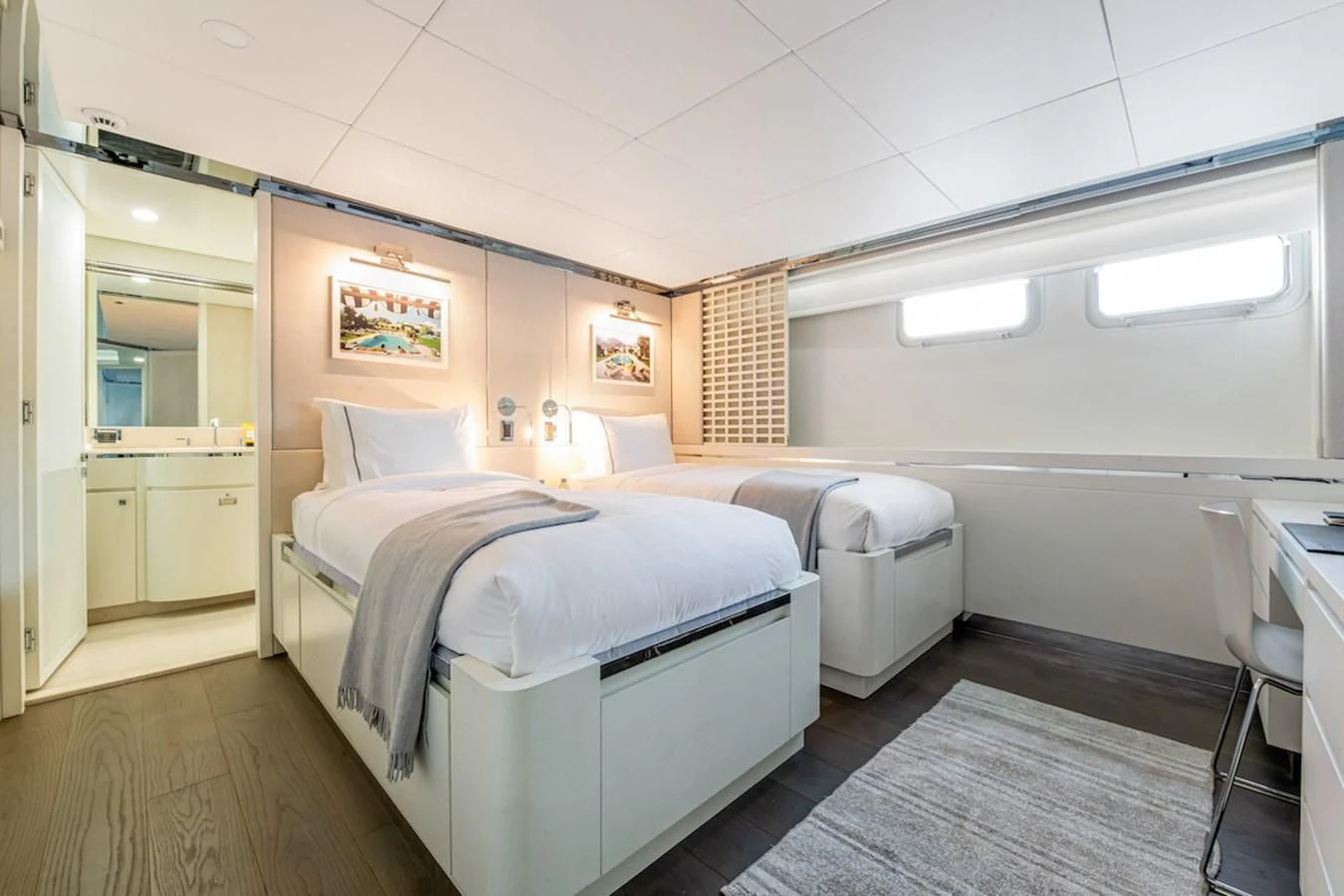 a room with two beds aboard BG Yacht for Sale