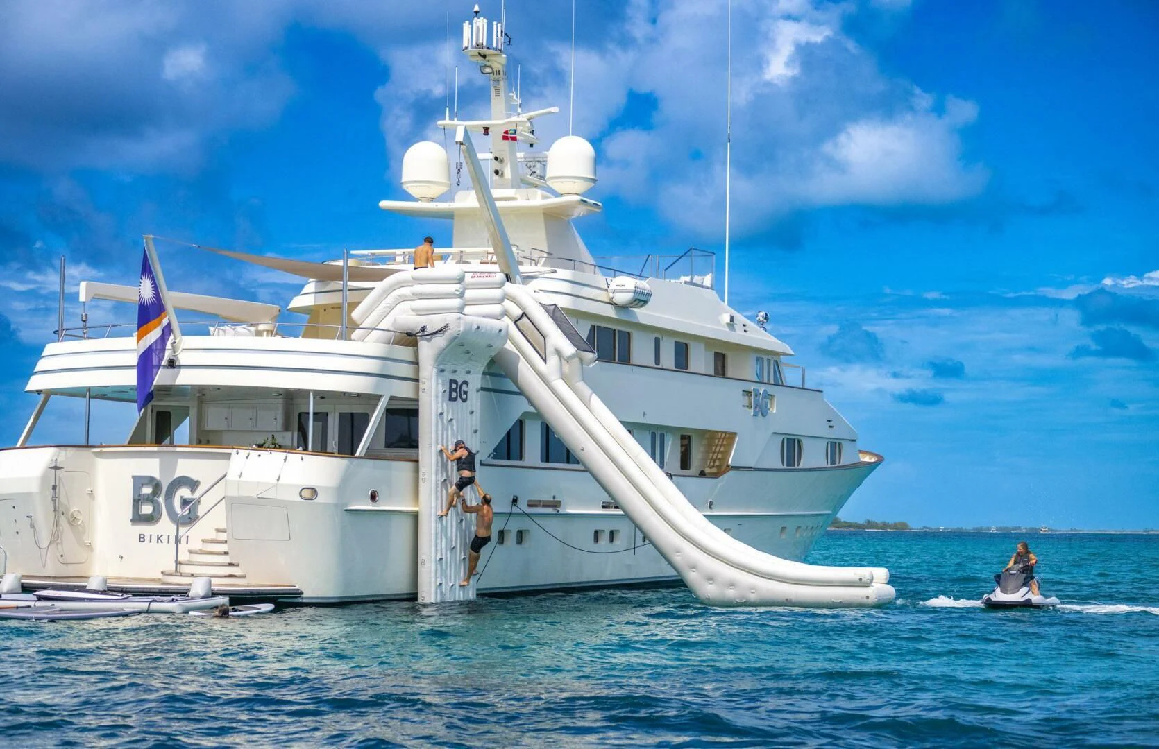 a large white boat in the water aboard BG Yacht for Sale