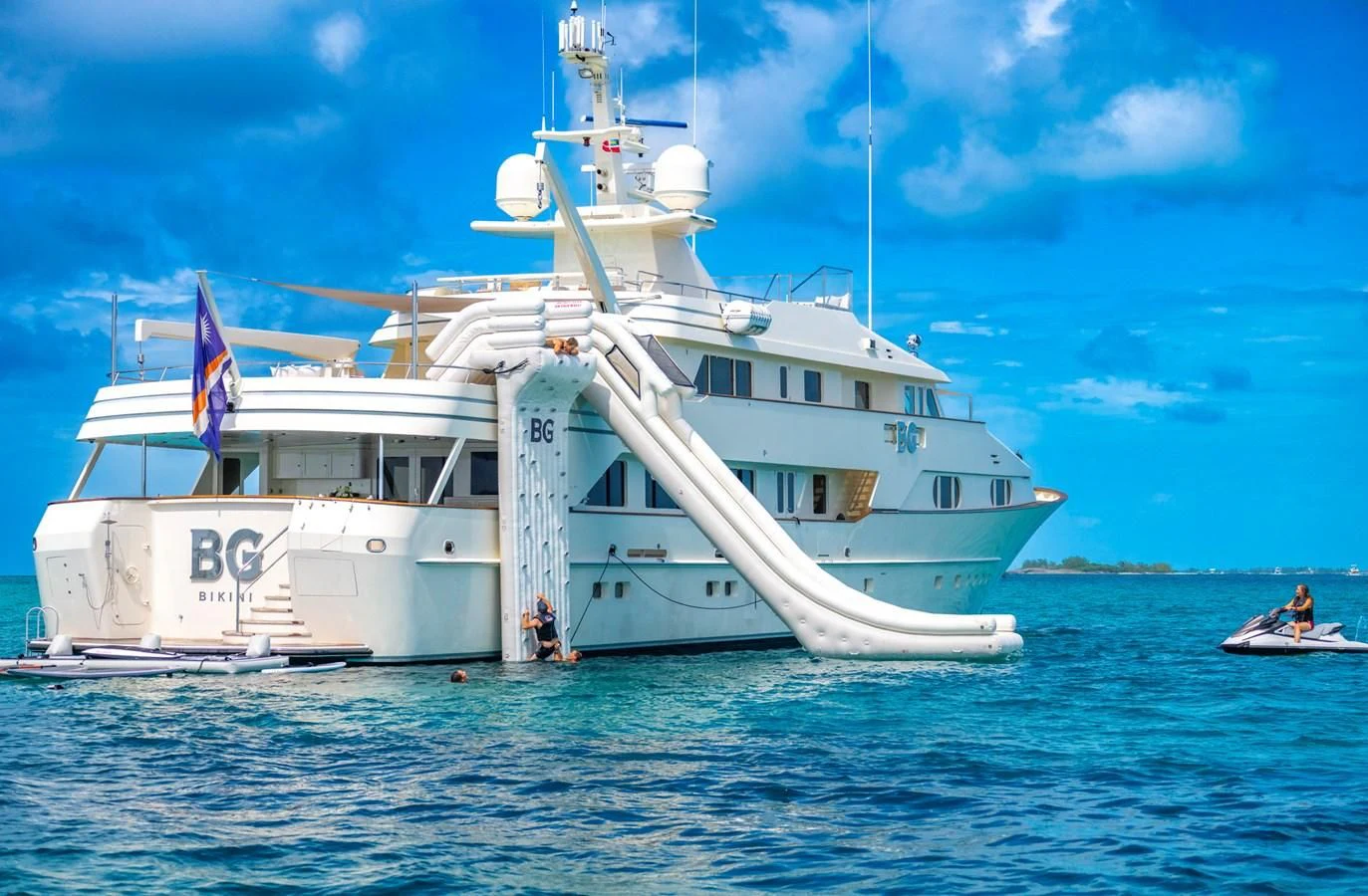a large white boat in the water aboard BG Yacht for Sale