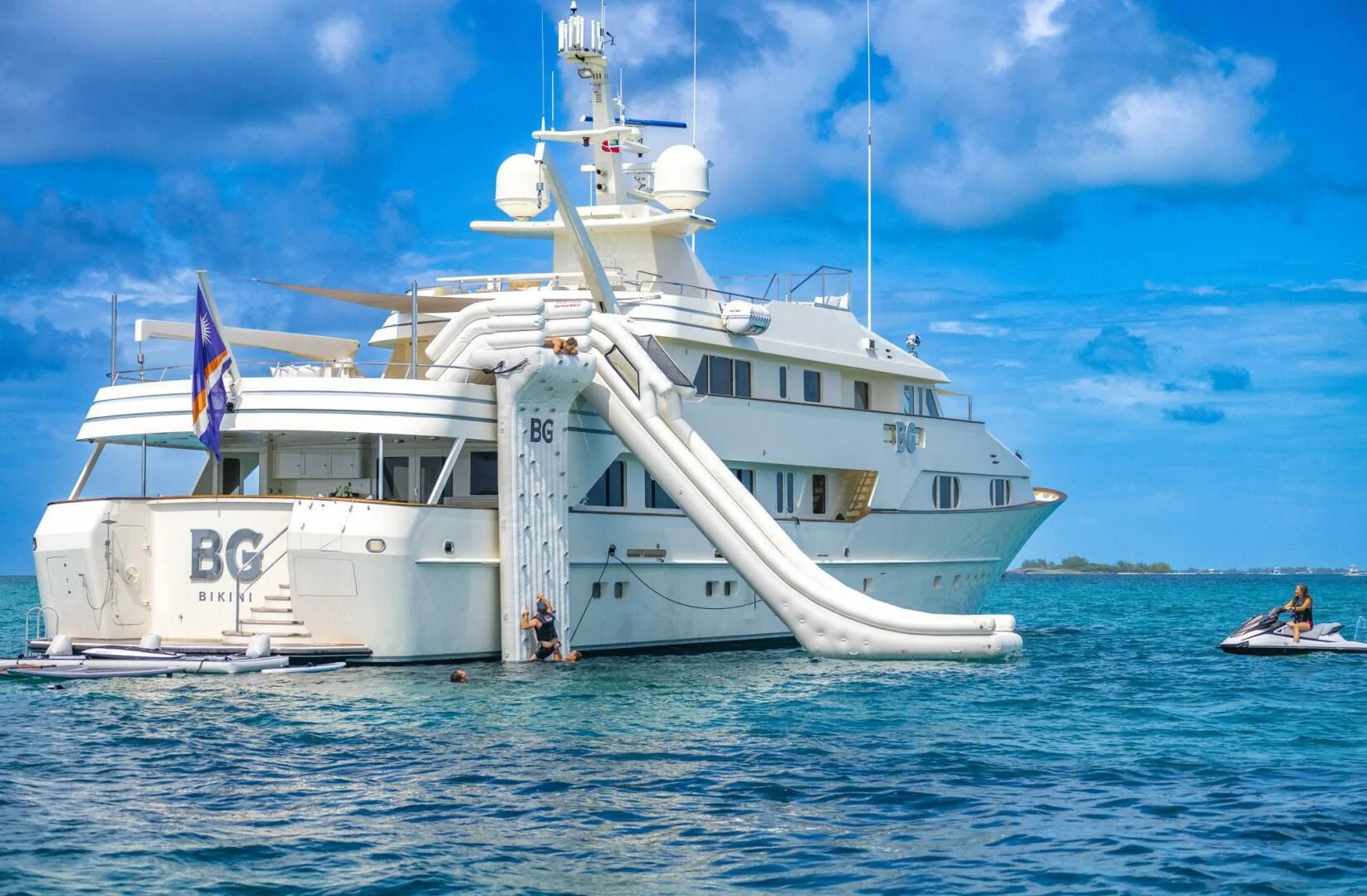 a large white boat in the water aboard BG Yacht for Sale