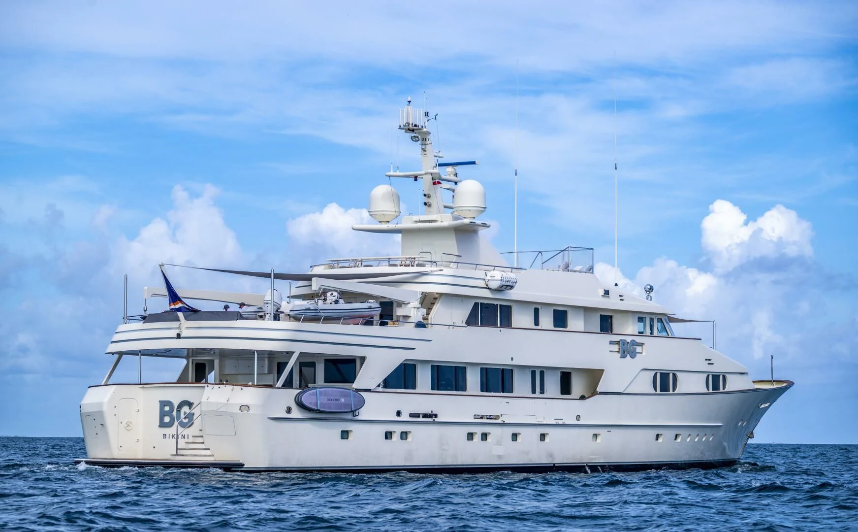 a white yacht in the water aboard BG Yacht for Sale