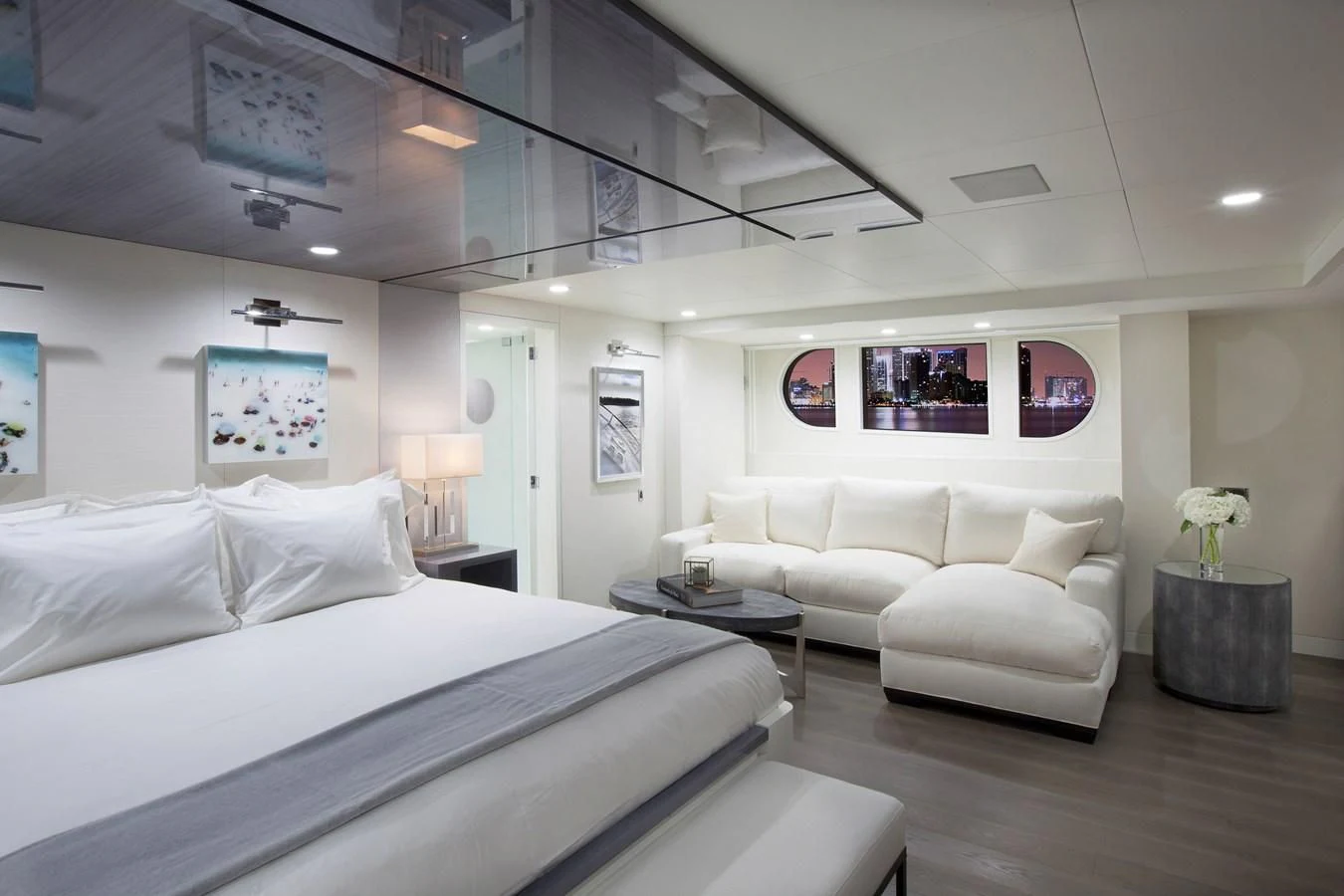 a room with a bed and a couch aboard BG Yacht for Sale
