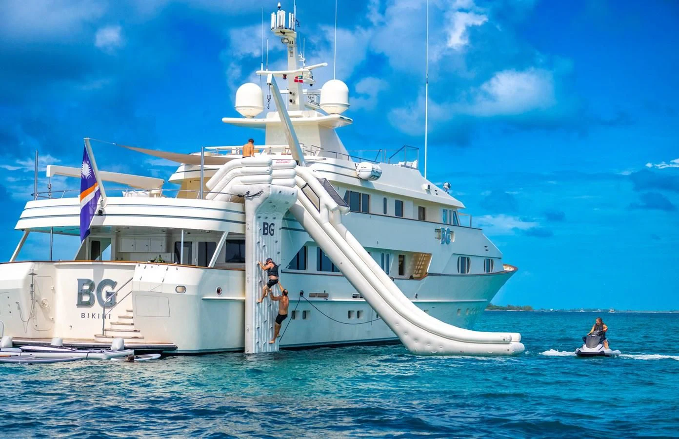a large white boat in the water aboard BG Yacht for Sale