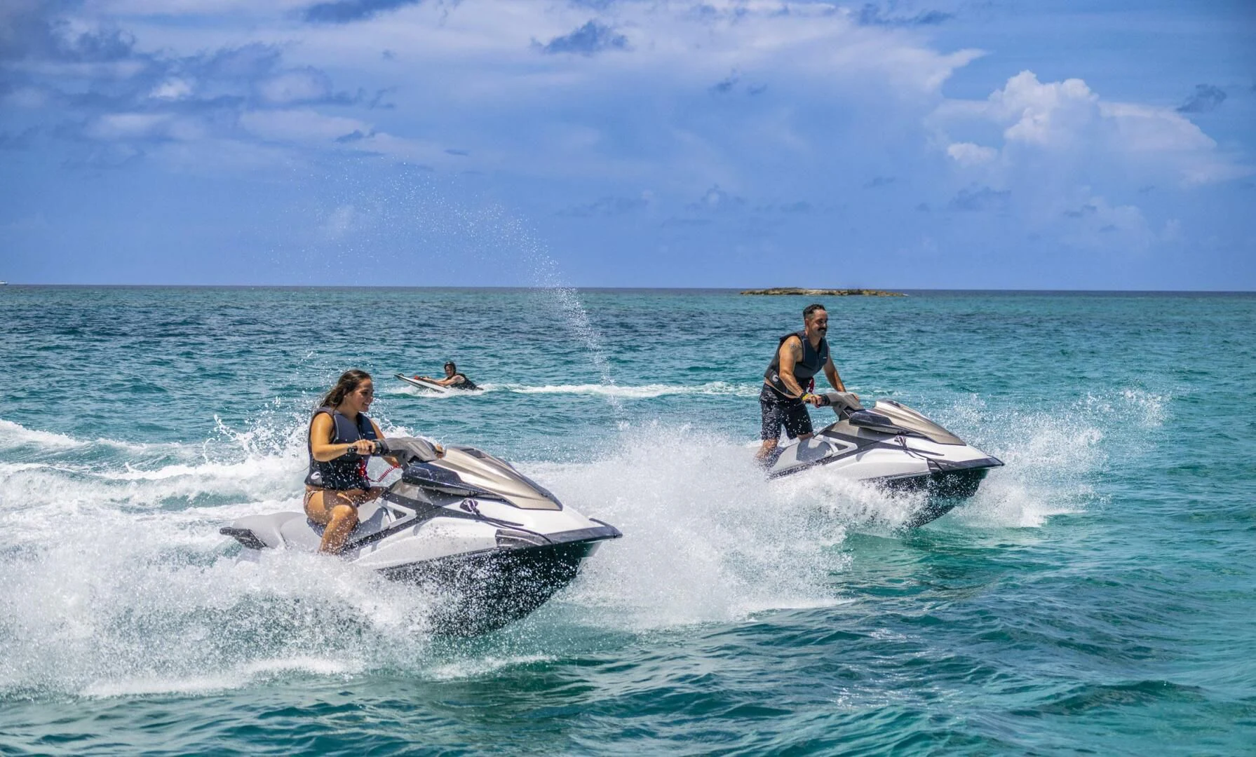 people on a jet ski aboard BG Yacht for Sale