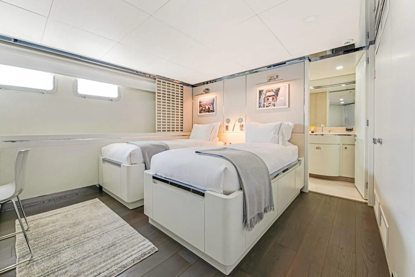 a room with a couple of beds aboard BG Yacht for Sale