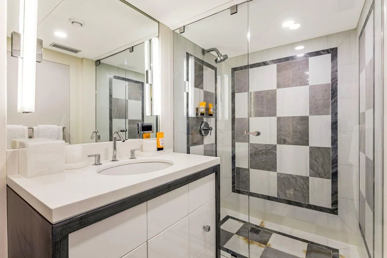 a bathroom with a sink and a shower aboard BG Yacht for Sale