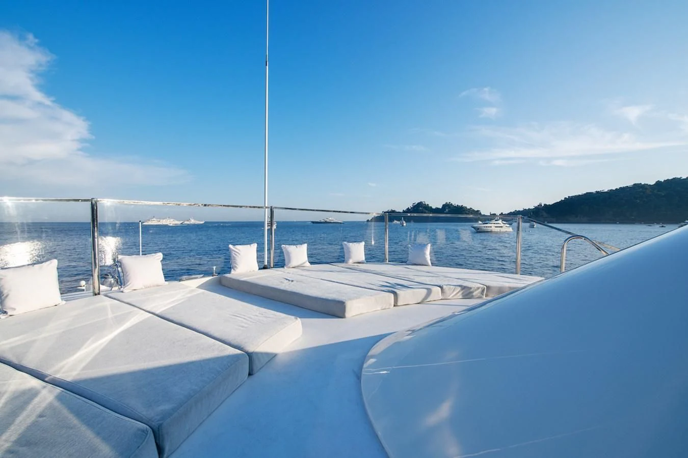 a deck with chairs on it aboard BG Yacht for Sale
