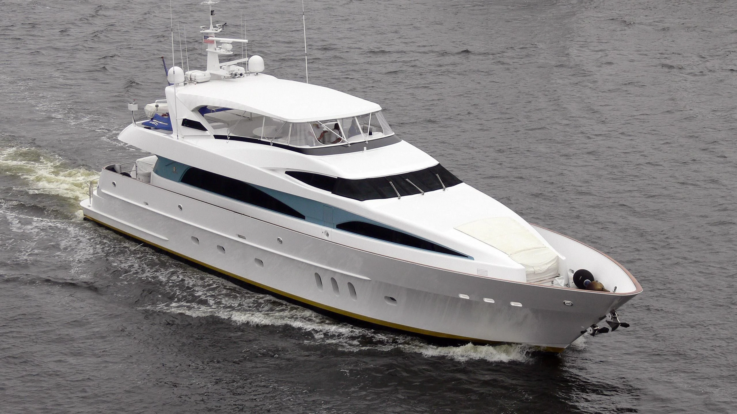a white yacht on the water aboard STREGA Yacht for Sale