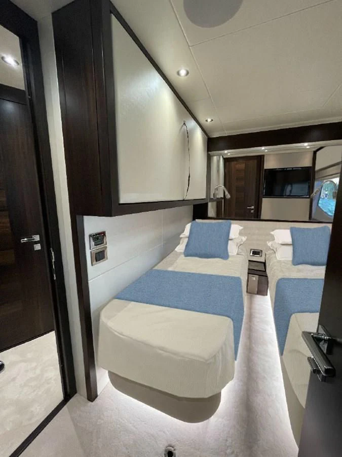 a bed in a room aboard CHINONINO Yacht for Sale