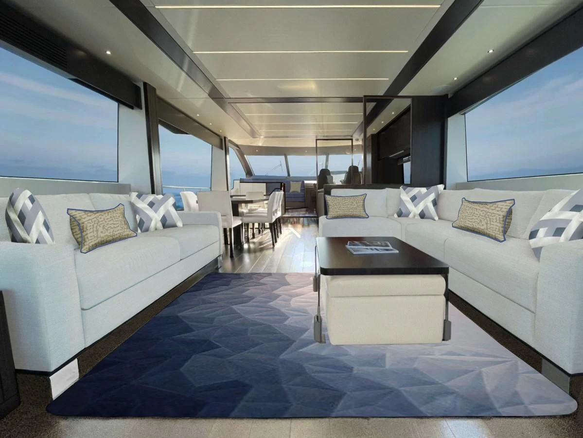 a large room with a couch and a table aboard CHINONINO Yacht for Sale