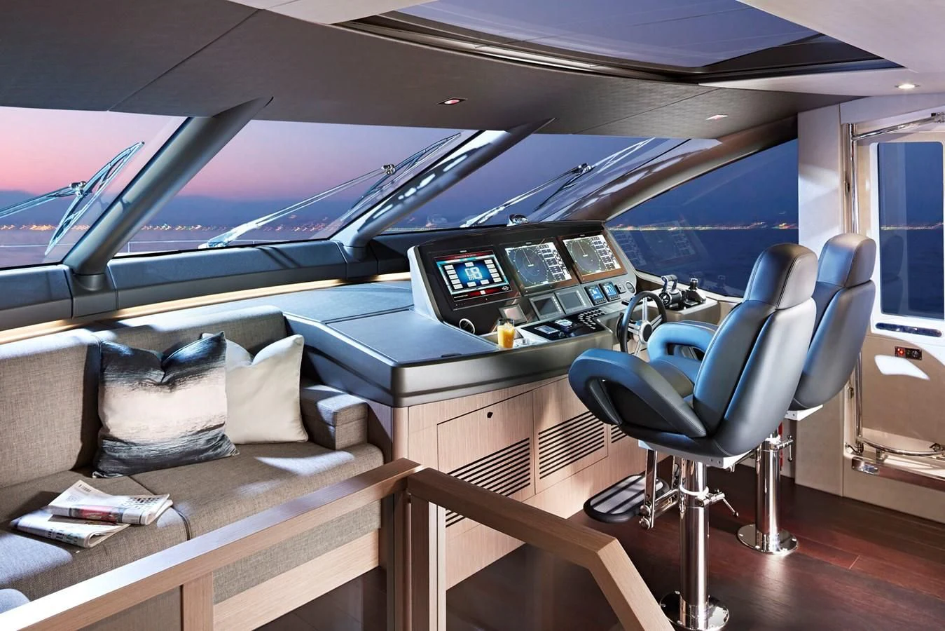 a room with a view of the water and the deck aboard CHINONINO Yacht for Sale