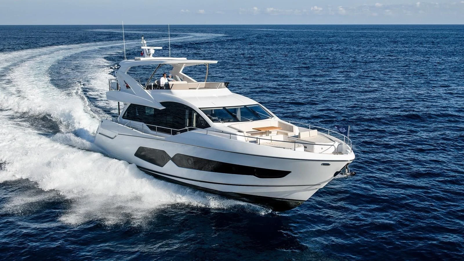 a white yacht on the water aboard CHINONINO Yacht for Sale