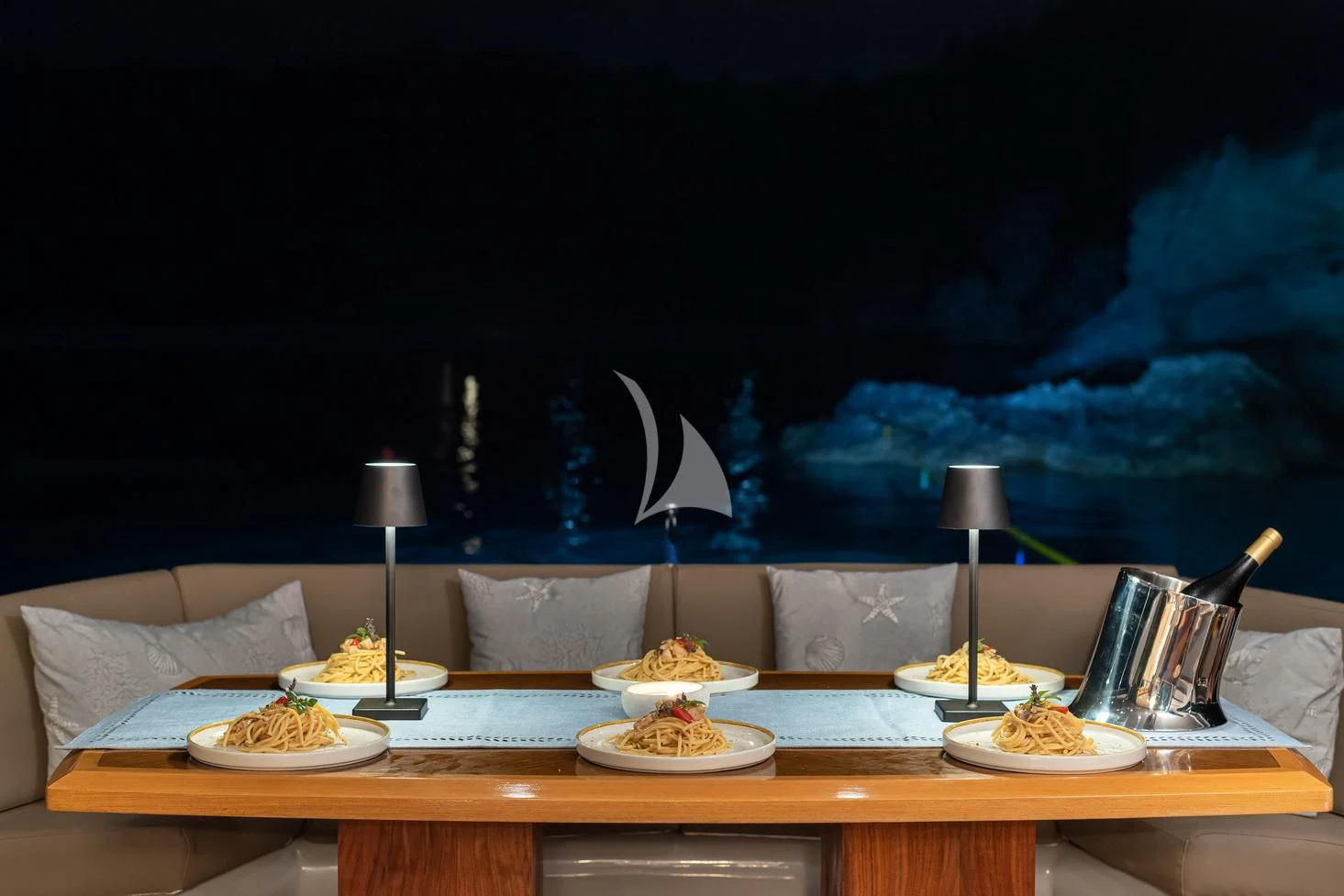 a table with food on it aboard STELA 117 Yacht for Sale